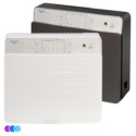 Two Aerovex Systems Wall Mounted Air Purifier systems, one white and one gray, are side by side. Both have ridged fronts, top control panels with buttons and LEDs, branding, and three small colored circles (purple, blue, cyan) in the lower left corner. Read more at Aerovex Systems (aerovexsystems.com)
