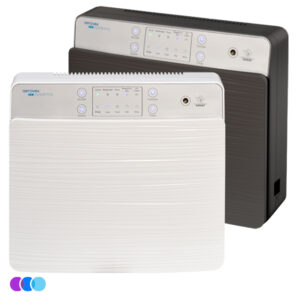 Two Aerovex Systems Wall Mounted Air Purifier systems, one white and one gray, are side by side. Both have ridged fronts, top control panels with buttons and LEDs, branding, and three small colored circles (purple, blue, cyan) in the lower left corner. Read more at Aerovex Systems (aerovexsystems.com)