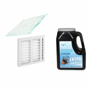 The Chemical Source Capture System Replacement Filters are shown: a translucent filter pad, a white rectangular air filter with slats, and a black jug labeled "Activated Carbon Extra Long Life" with a coconut shell image on a white background. Read more at Aerovex Systems (aerovexsystems.com)