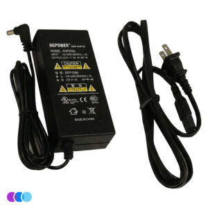 A Sunflower II LED Replacement Power Adaptor. It is rectangular black AC/DC power adapter for the Aerovex Sunflower II LED Nail Dust Collector with a connected cord ending in a round barrel plug, next to a separate black power cable with a two-prong plug. The adapter has a label with specifications and caution symbols printed in yellow and white. Read more at Aerovex Systems (aerovexsystems.com)