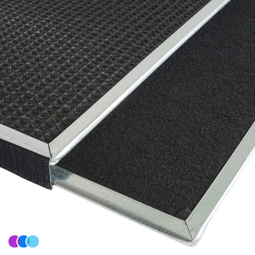 aerovex-dust-plus-install-filter-view A close-up of the Aerovex Dust Plus vent filter system. The activated carbon filter is removable, depicted by a soft black, fleece-like surface. The electrostatic filter is permanently installed in the housing and has a plastic filament square pattern on the filter. Three small color circles (purple, blue, light blue) appear in the corner. Read more at Aerovex Systems (aerovexsystems.com)