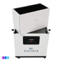 A white Aerovex Whisper™ salon source capture system with a digital control panel on the front is shown open. The black interior and rectangular filter component are visible, with the filter lifted above the unit. Three colored circles are at the bottom left corner. Read more at Aerovex Systems (aerovexsystems.com)