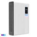 A sleek, rectangular white Aerovex Max wall mounted air purifier with vertical grooves on the front and a dark vent on the side. A digital display screen shows numbers and controls near the top right of the front panel. Three small colored circles are in the bottom left corner. Read more at Aerovex Systems (aerovexsystems.com)