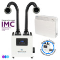 A white Aerovex WHISPER MiniVent salon source capture system with two flexible black exhaust hoses with LED lights and digital display is shown next to a white wall-mounted air purifier unit. Icons indicate it meets IMC standards and includes an exhaust hose that vents to the outside. Read more at Aerovex Systems (aerovexsystems.com)