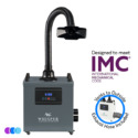 A gray portable Aerovex Systems Whisper MiniVent™ Source Capture System with a flexible black hose and vent hood is shown. Text reads "Designed to meet IMC International Mechanical Code" and "Vents to Outside, Exhaust Hose Included. Read more at Aerovex Systems (aerovexsystems.com)